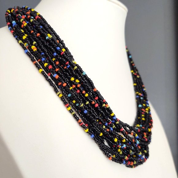 Multi strand black seed bead necklace with bright bead accents - Picture 4 of 13